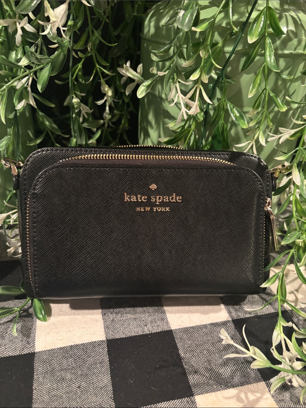 kate spade black saffiano leather zip-around wallet with gold logo